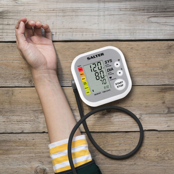 Woman Measuring Blood Pressure And Pulse While Nervous